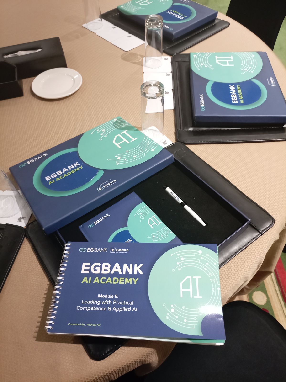 دفتر تدريبي Module 6 وعلبة ومجلد فعالية EGBank AI Academy